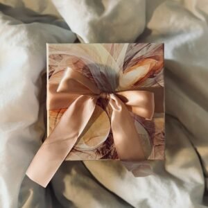 white and brown floral paper on white textile